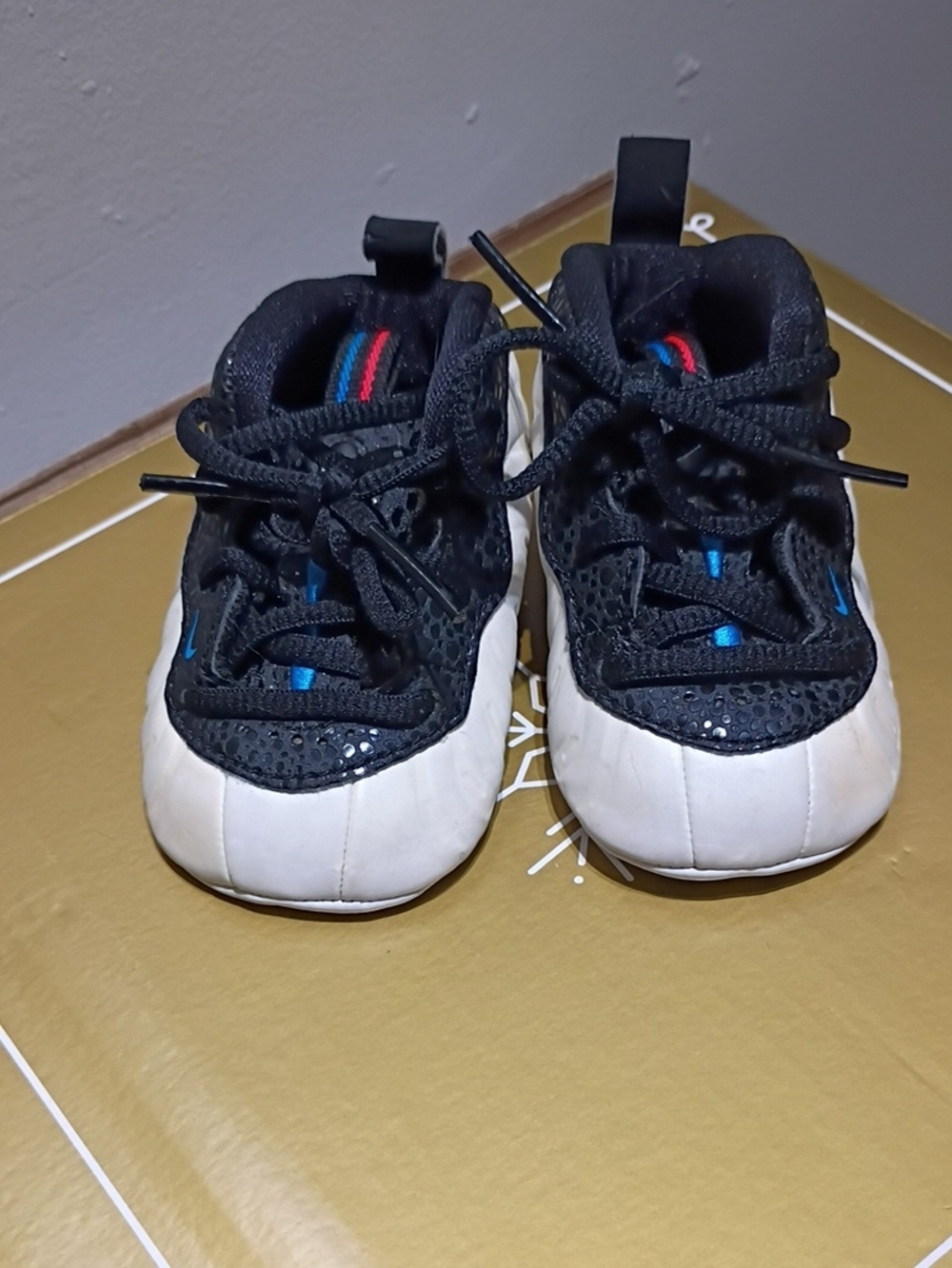 Nike Black and White Baby Walker Sneakers with Blue and Red Accents